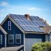 Grey Home with Solar panels | TitaniumInvest