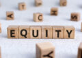 Wooden blocks spelling "EQUITY" are arranged in a row against a light background. Additional blocks with individual letters are scattered around them, subtly emphasizing the concept of equity in an engaging and playful manner. | TitaniumInvest
