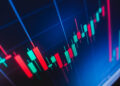 A close-up of a financial chart displays green and red candlesticks on a dark background, highlighting trends in market analysis and stock trading data. | TitaniumInvest